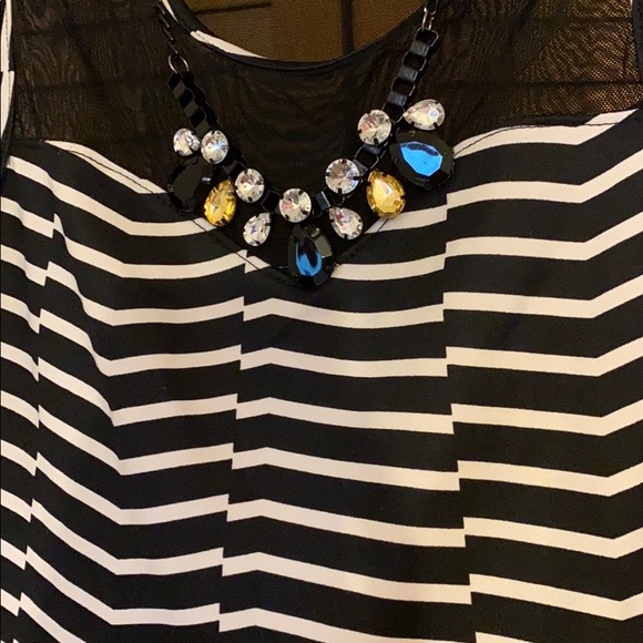 Sleeveless black and white stripe peplum top - Picture 2 of 2